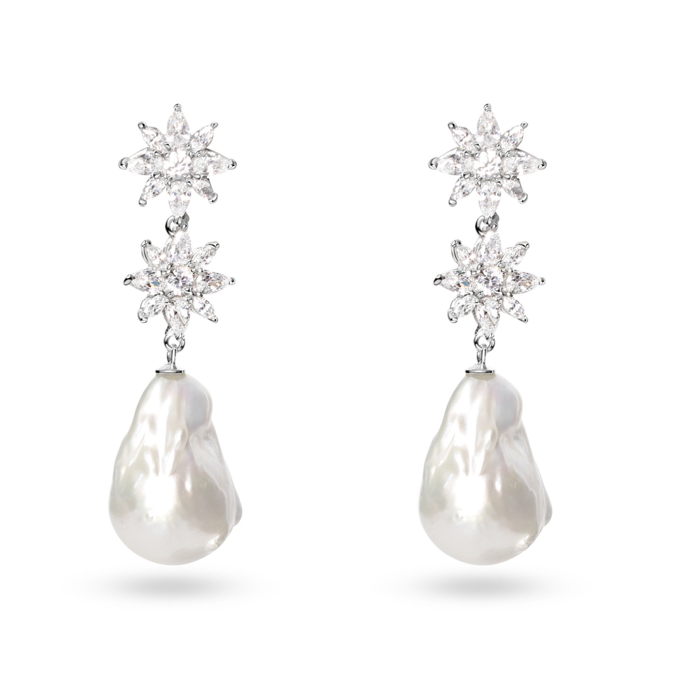 Silver dangle earrings pearl is perfect for brides. An elegant design for pearl and diamond earrings lovers.