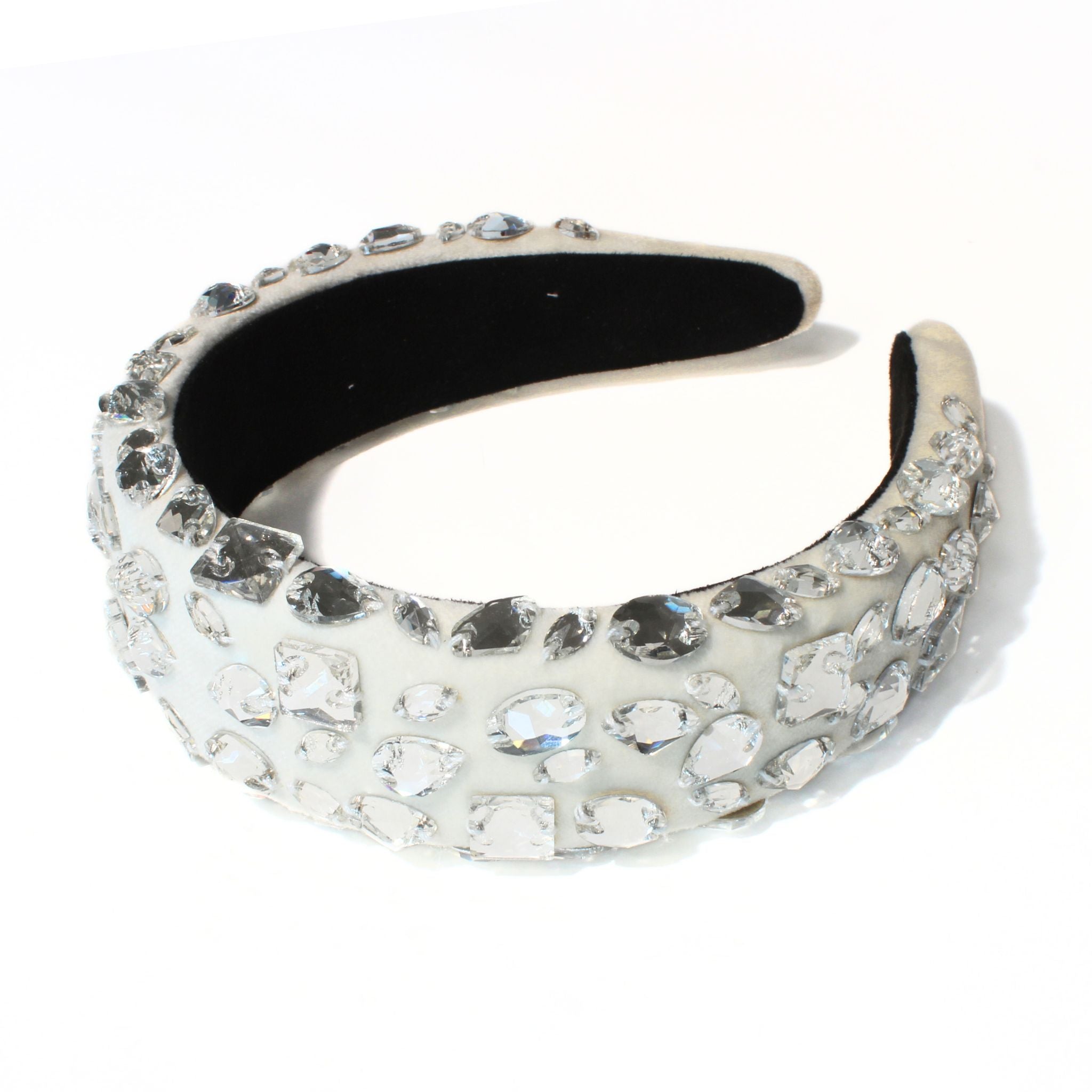 One of our wedding headpieces for brides — a white band worked over end to end in crystal.