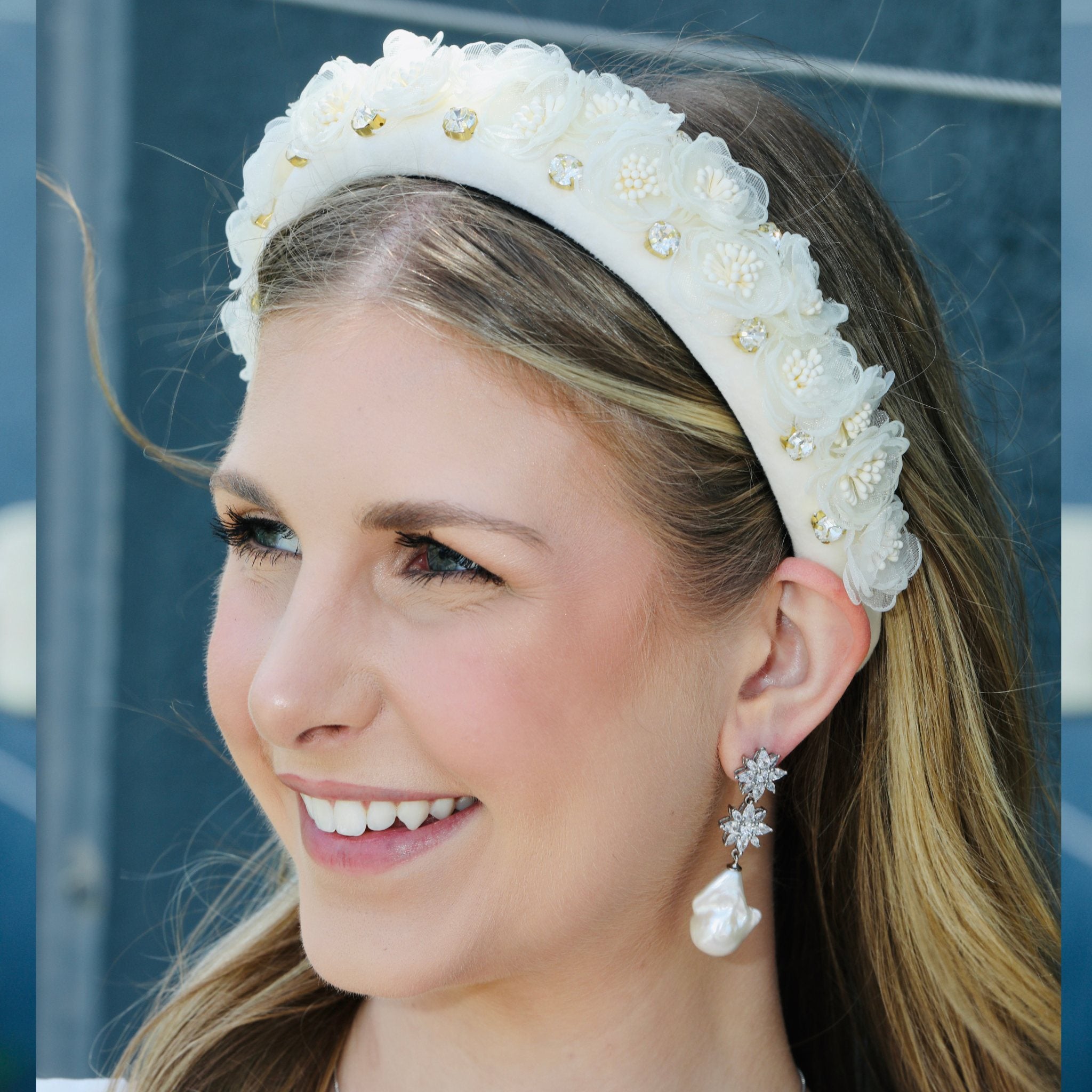 Women's floral headband in soft velvet with delicate silk flowers, ideal for special occasions.
