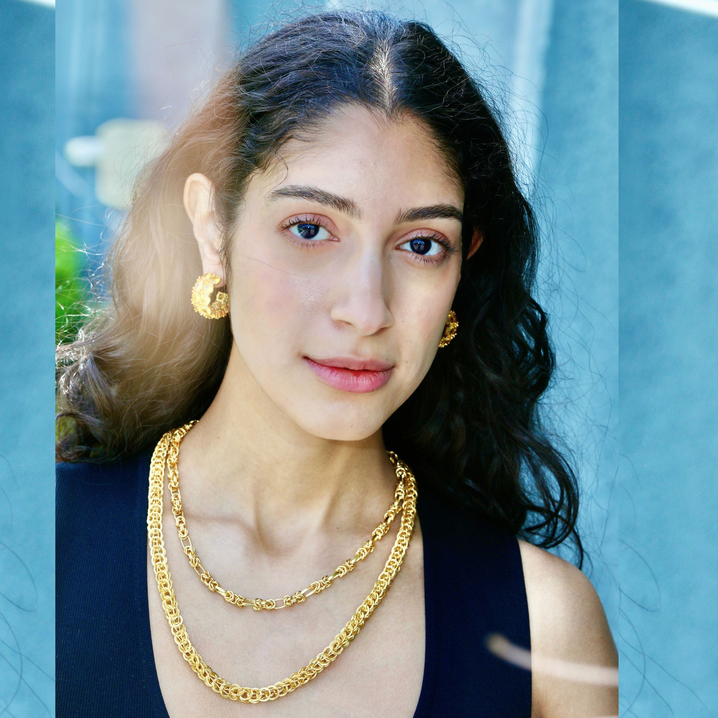 this gold plated 18K chain is a modern sculpted rope chain necklace. Designed by u-glam nyc