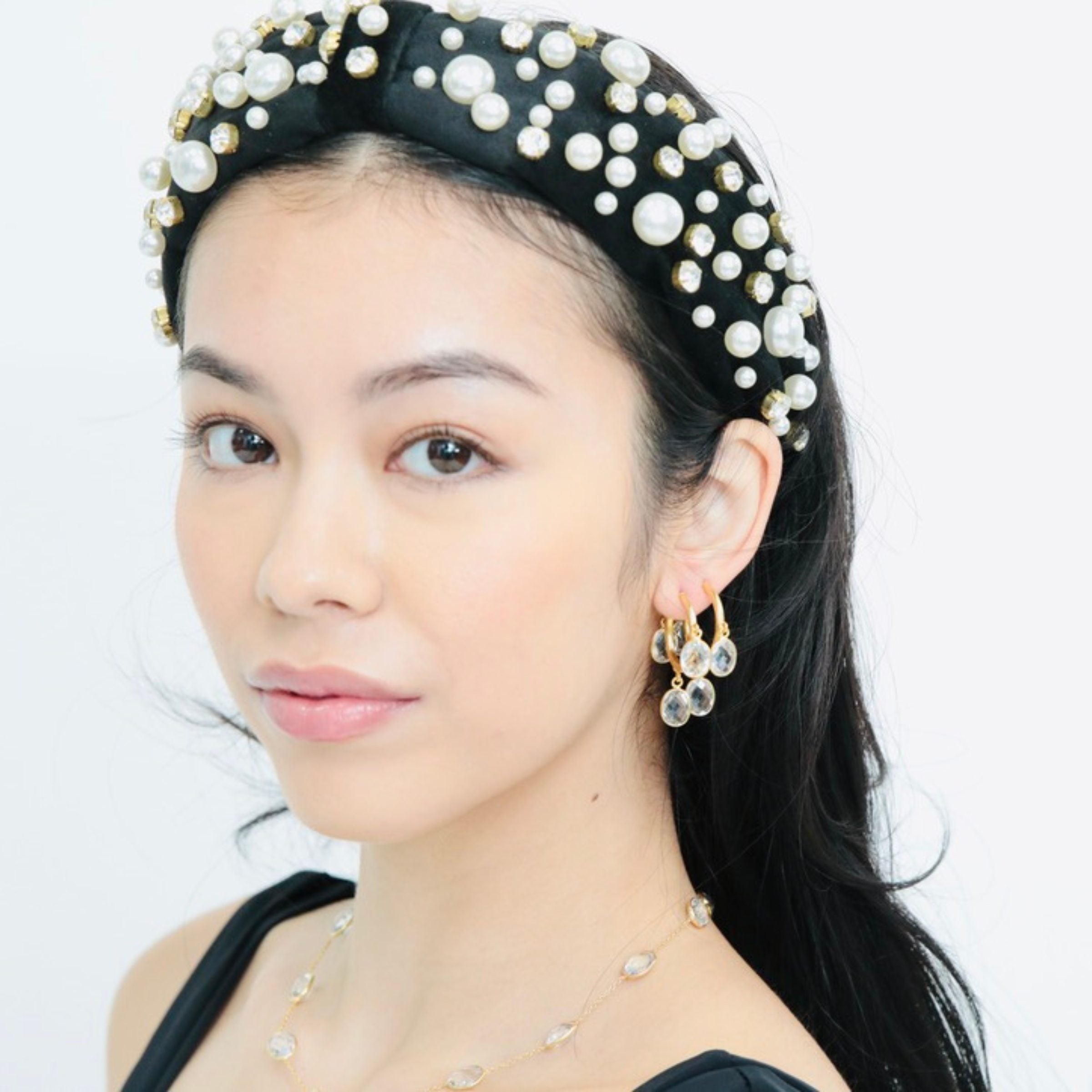 dainty earrings perfect for stacking. designed to bring up glamour effortlessly using upper lobe earrings