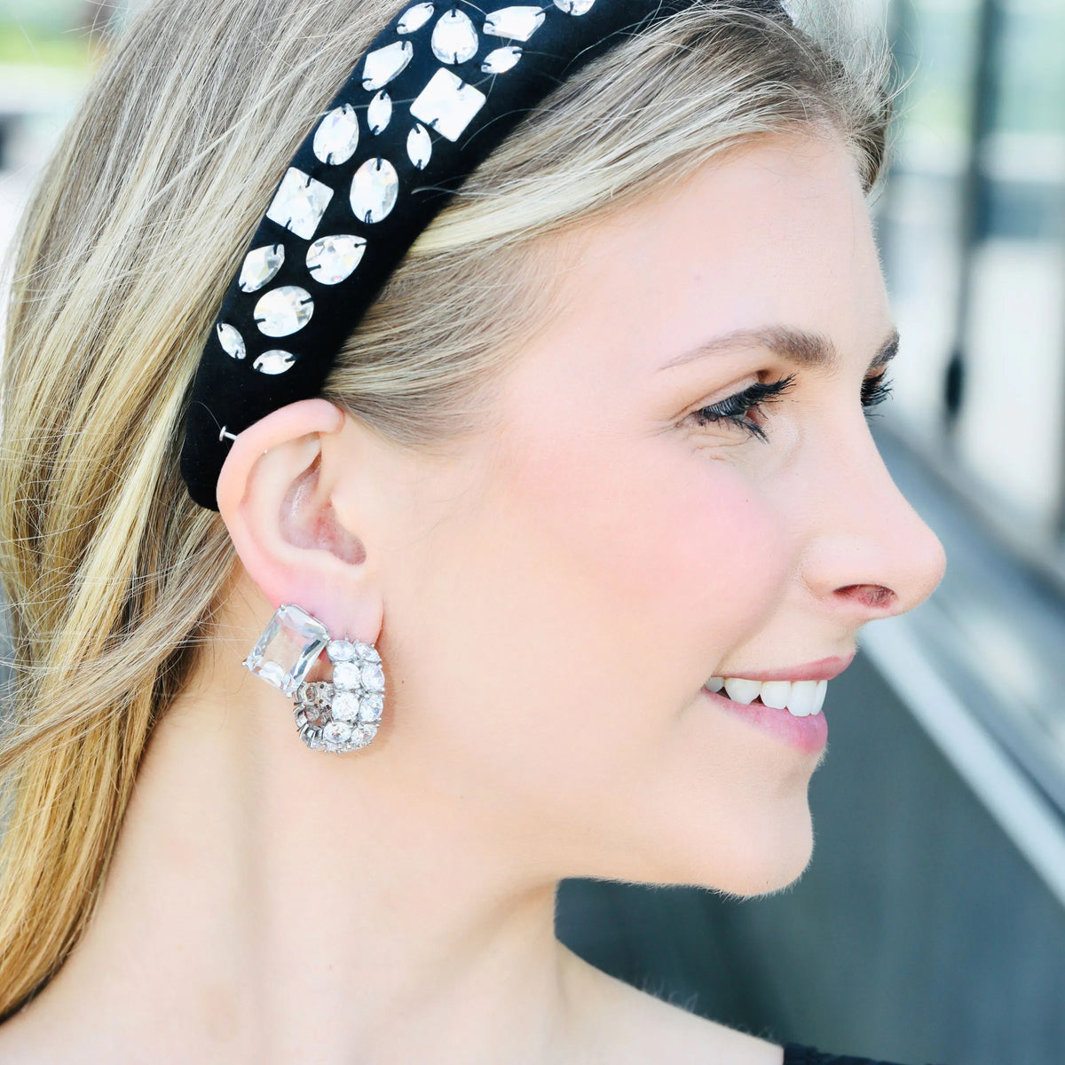 Close-up of CZ diamond hoop earrings showing two rows of stones