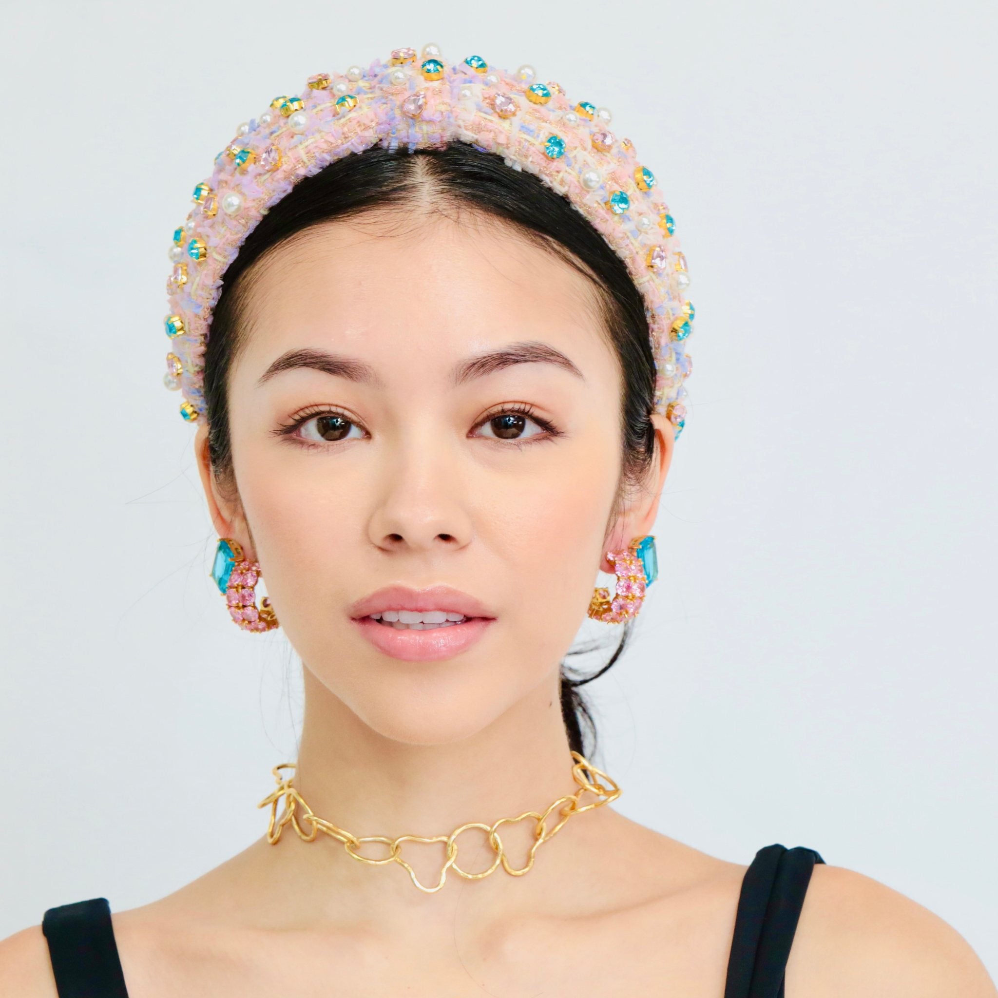 Hair bands with rhinestone embellishments and pearl accents, adding elegance to any outfit.