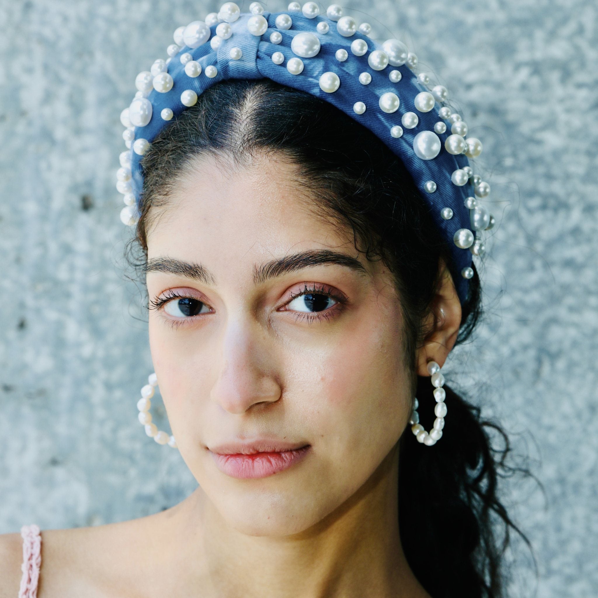 Pearls headband with a luxurious knotted design, perfect for casual and formal styling