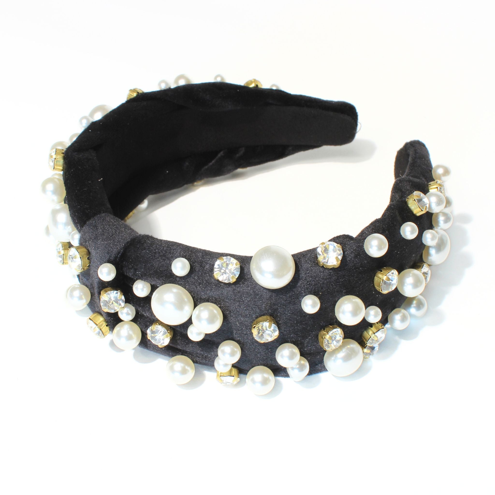 Black knot headband decorated with shimmering rhinestones and pearls for a sophisticated look