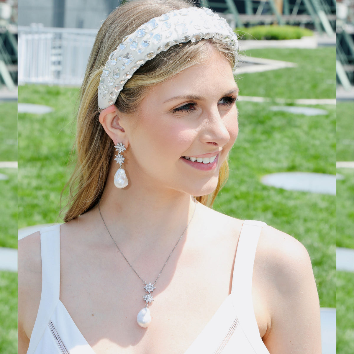 This baroque pearl pendant necklace and its matching drop earrings make for delicate, pure luxury, designed by u-glam NYC.