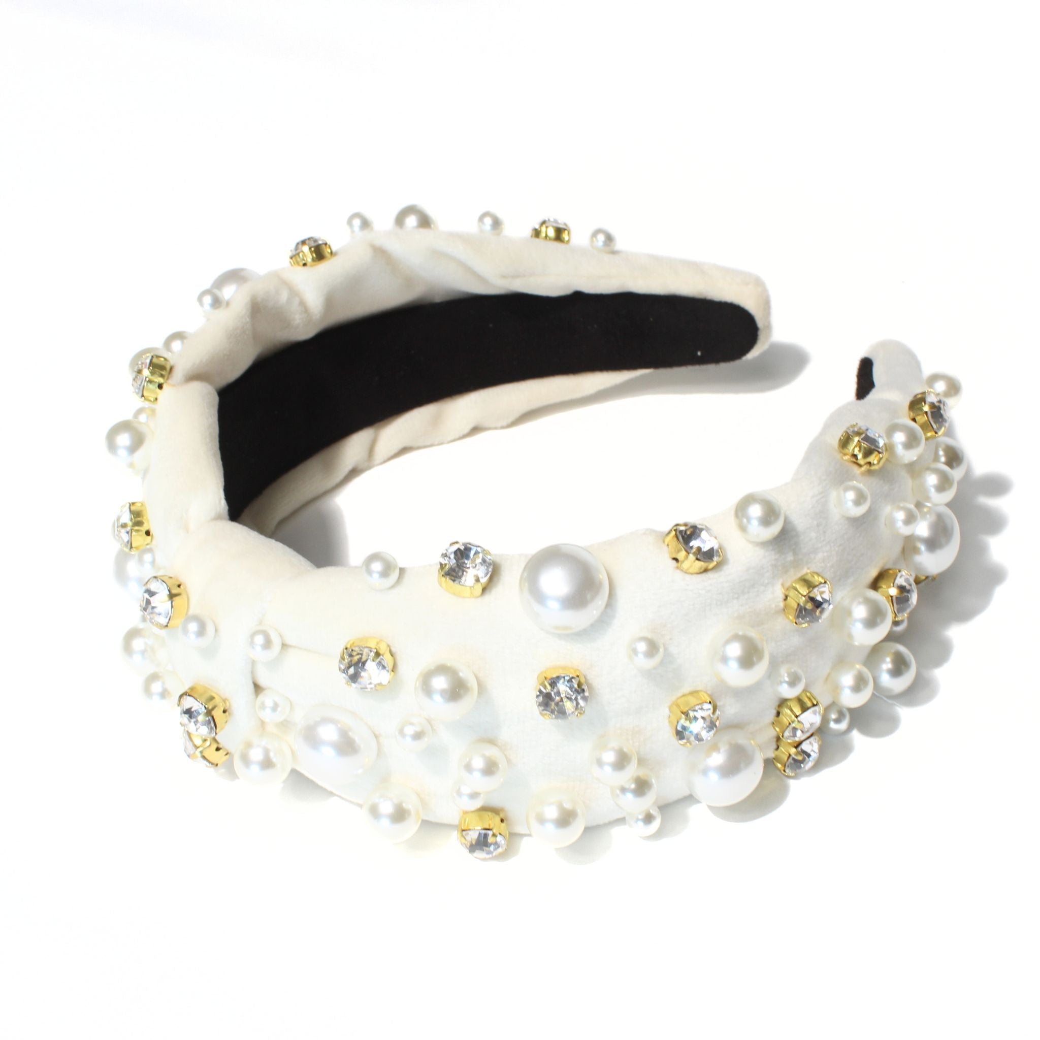 Bridal headband with pearls and rhinestones, designed for a timeless and elegant wedding look.