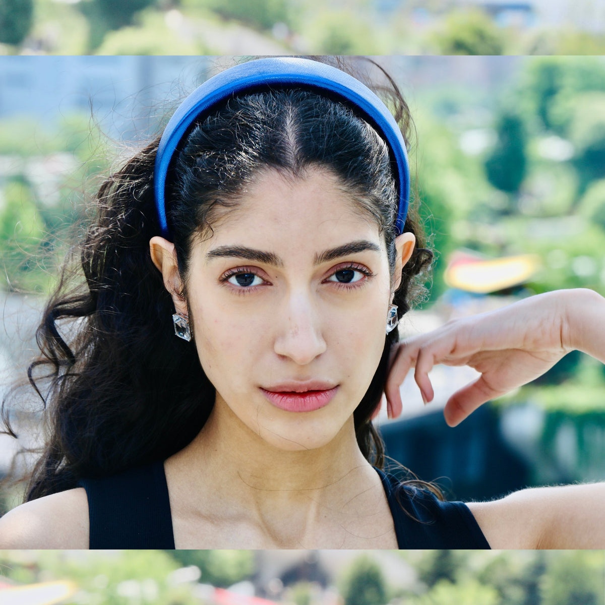 Leather hair band styled in royal blue, a versatile pop of color for any outfit