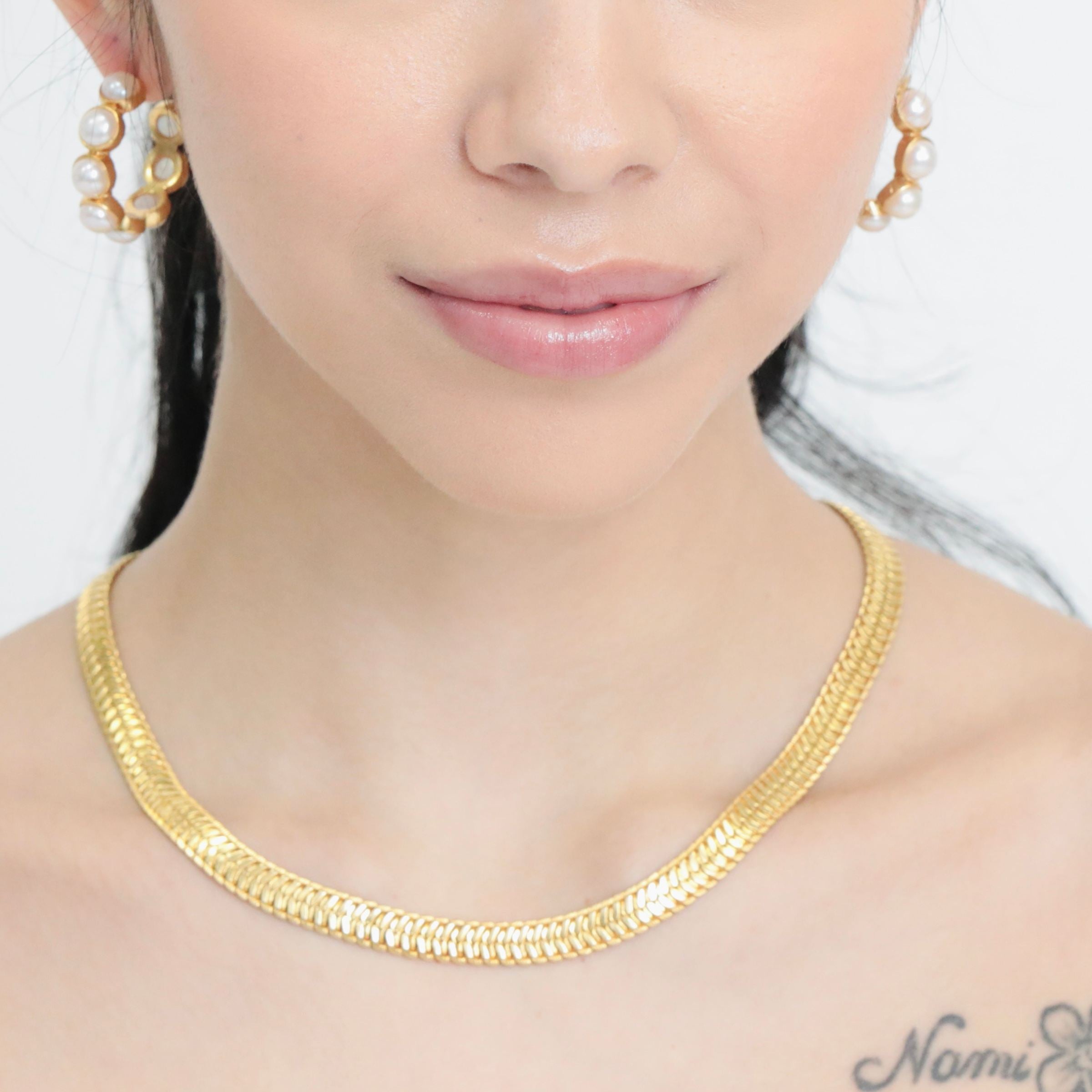 This snake chain necklace is great for men or women, and is our best seller. By U-glam Nyc