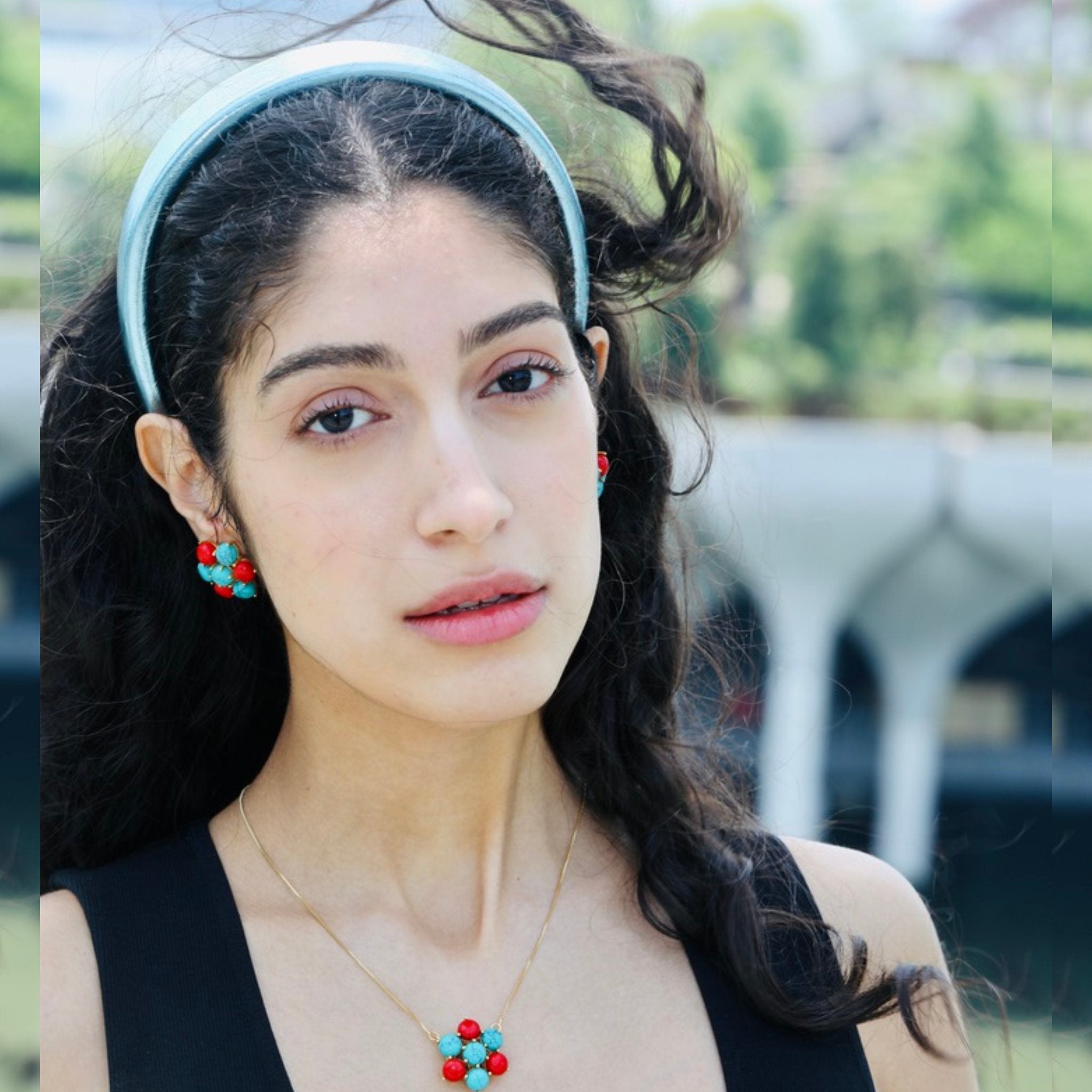 Designer headband in teal, featuring a padded structure for a trendy and effortless womens headband look.