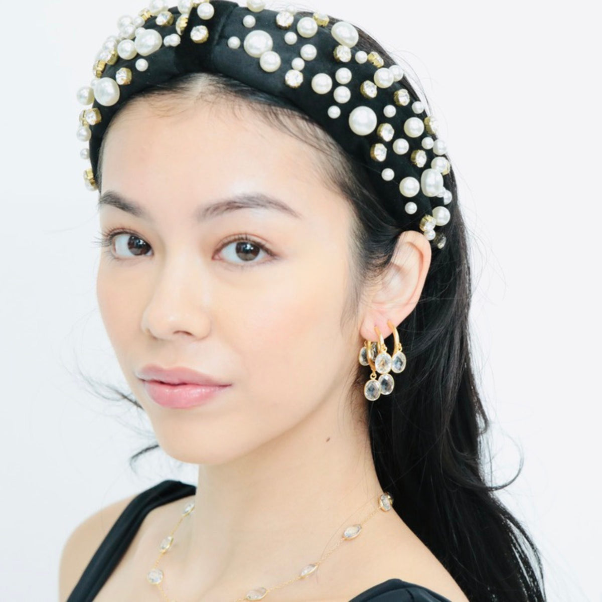 dainty earrings perfect for stacking. designed to bring up glamour effortlessly using upper lobe earrings