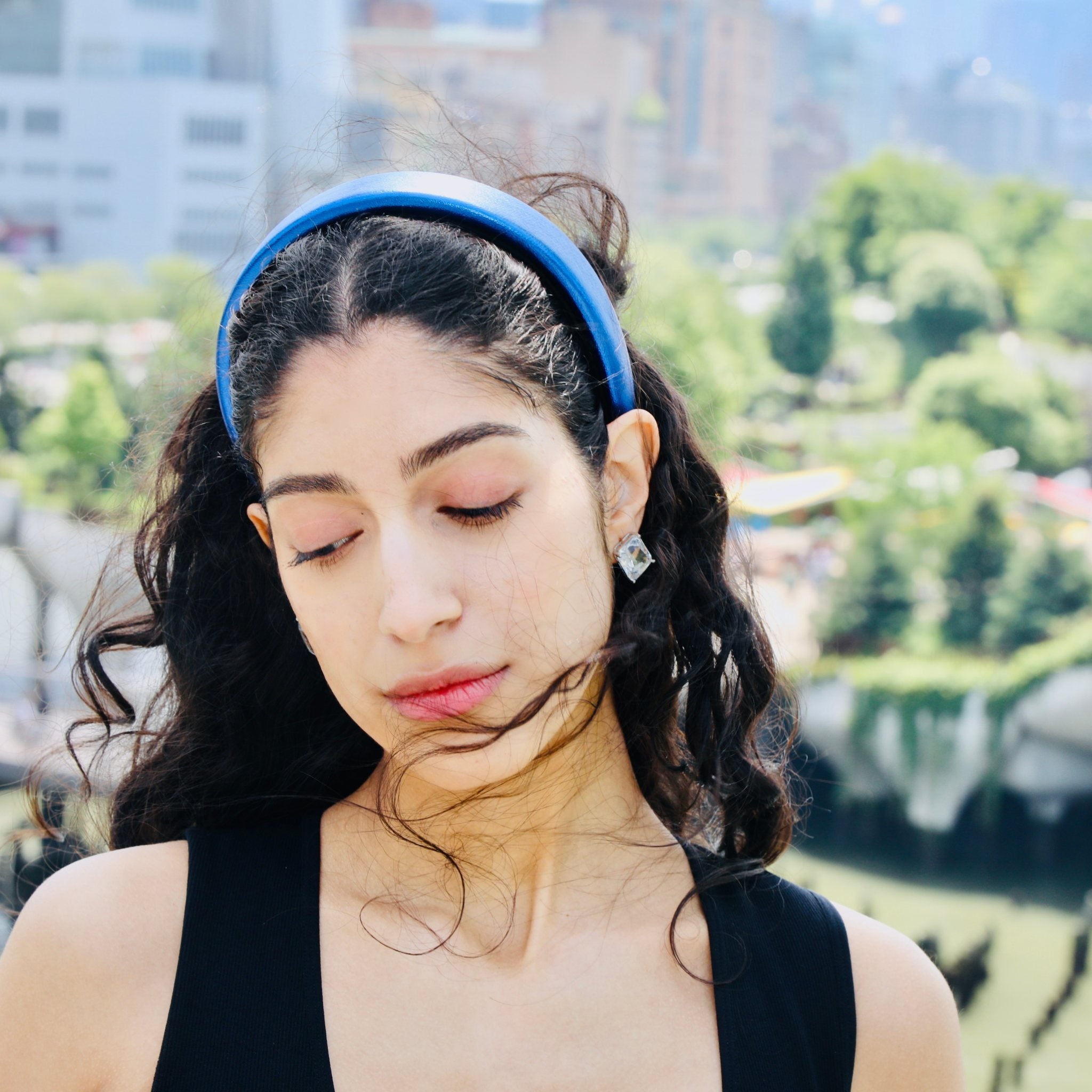 Designer headbands for women crafted from soft faux leather in a bold royal blue tone