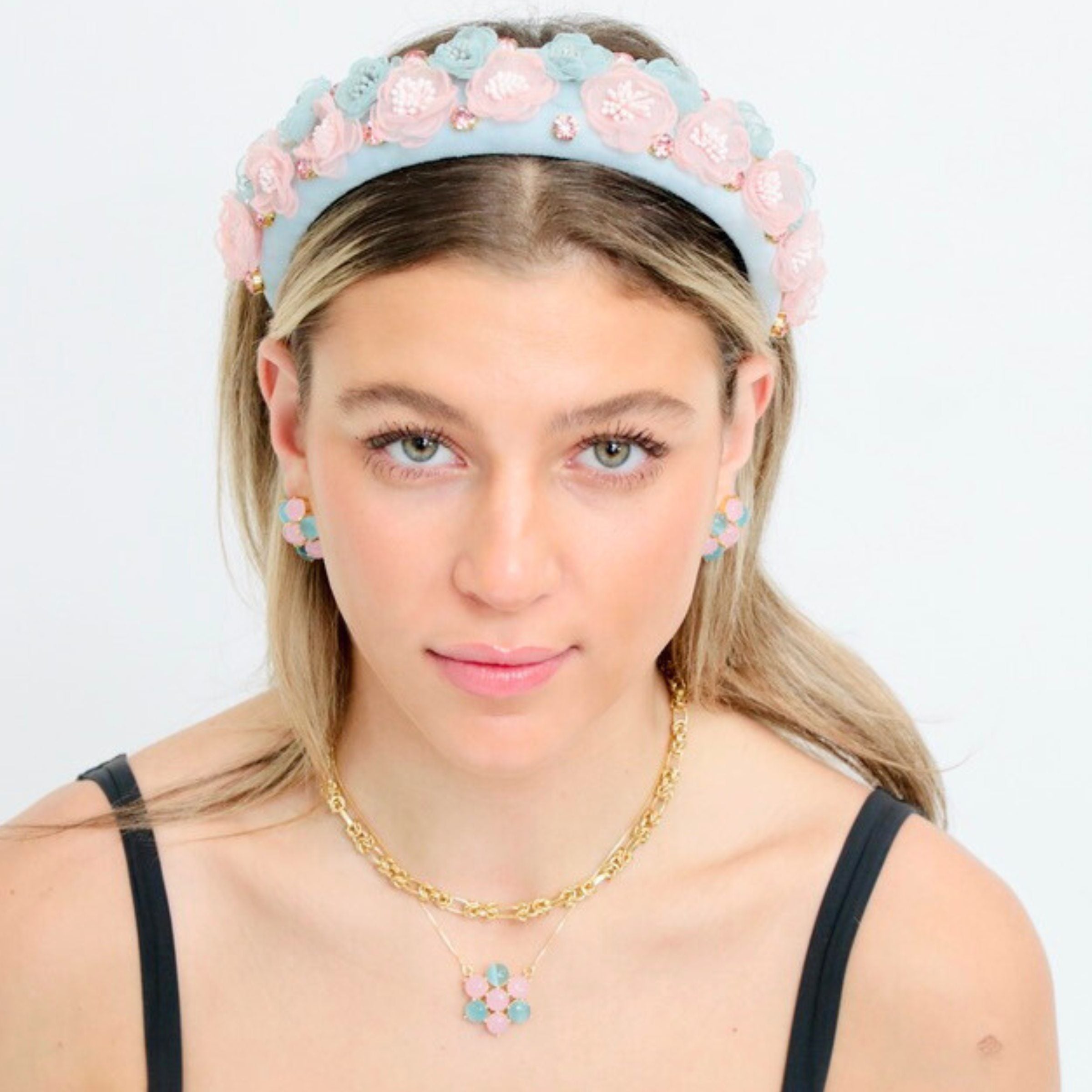 This pink and cyan cotton candy flower necklace is made from glossy cabochon stones — a pink statement necklace and one of our most colorful necklaces for everyday wear.