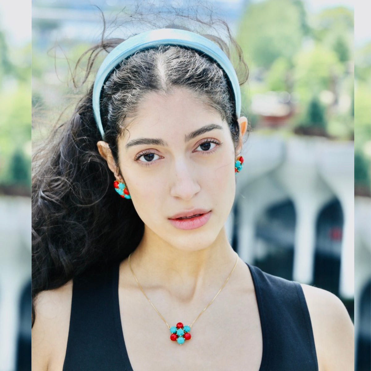 Pair this turquoise flower necklace with our flower earrings and leather headband for a coordinated look.
