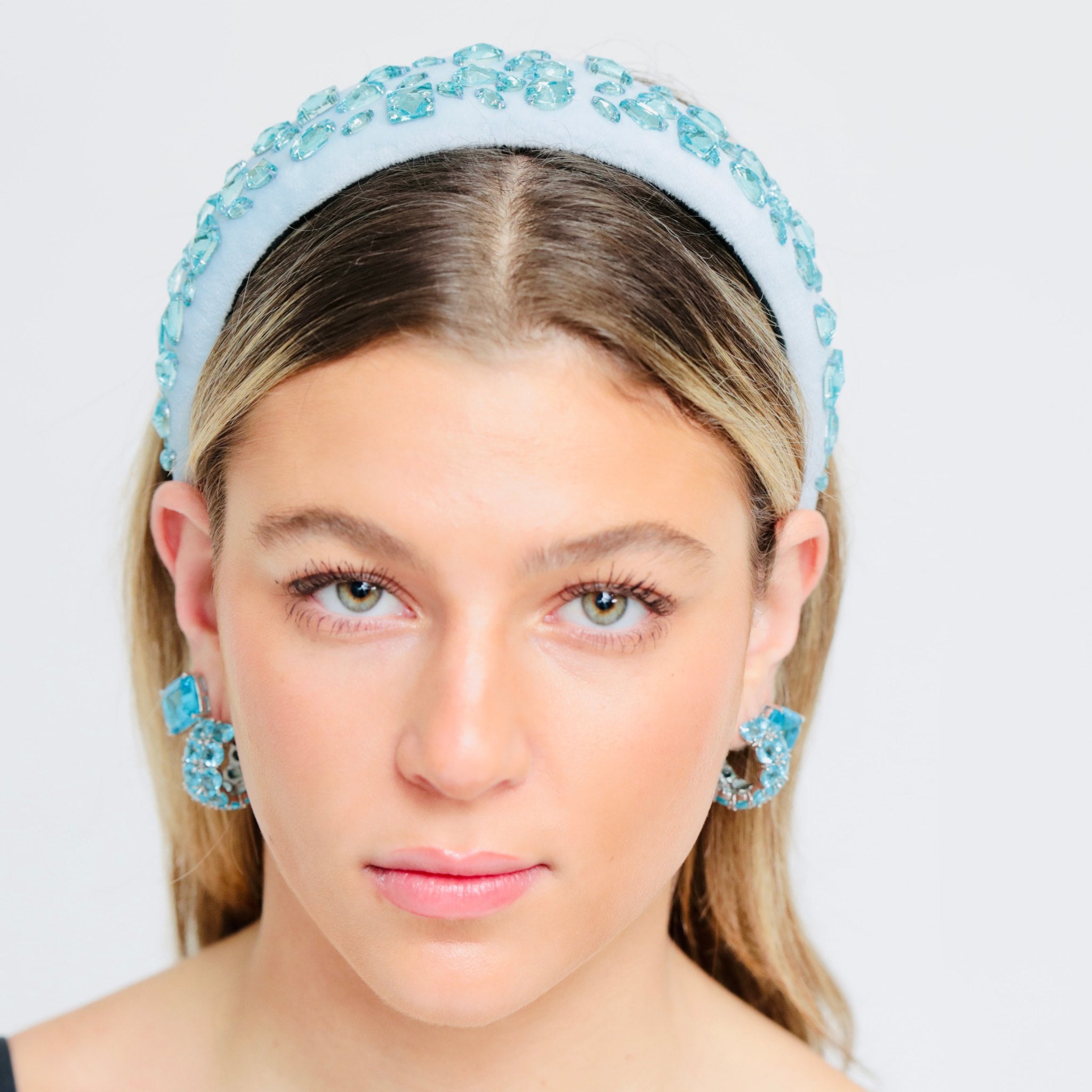 Close-up of the Swarovski grade crystal headband embellishment, adding refined sparkle to the design