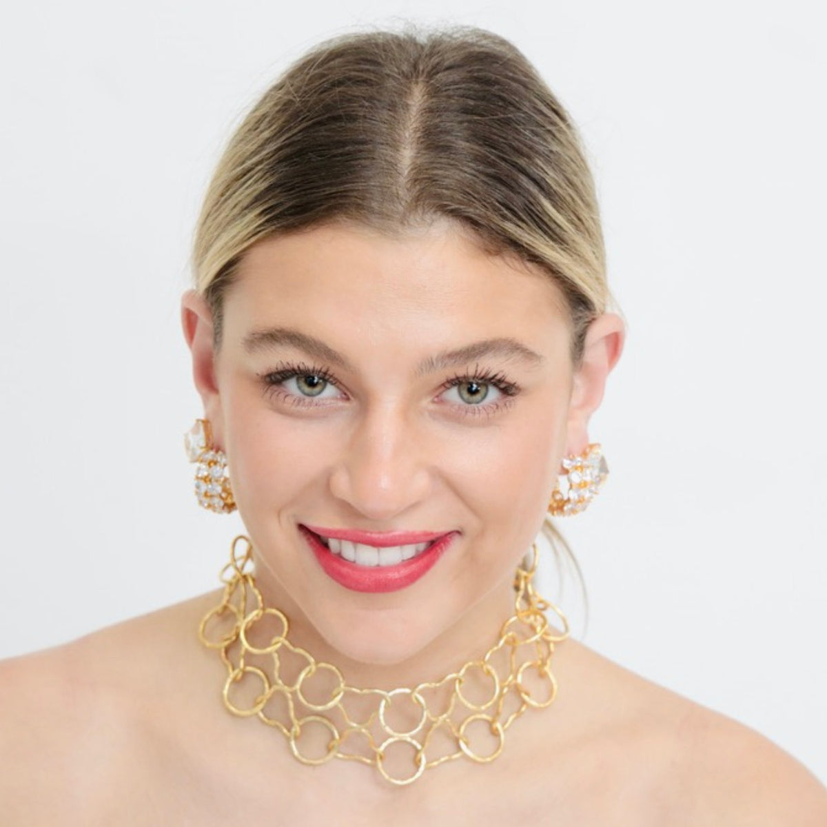 This statement necklace, Majesté, is designed in NYC — one of our most versatile choker necklaces for women, perfect paired with cz diamond hoop and crystal stud earrings for a red carpet look.