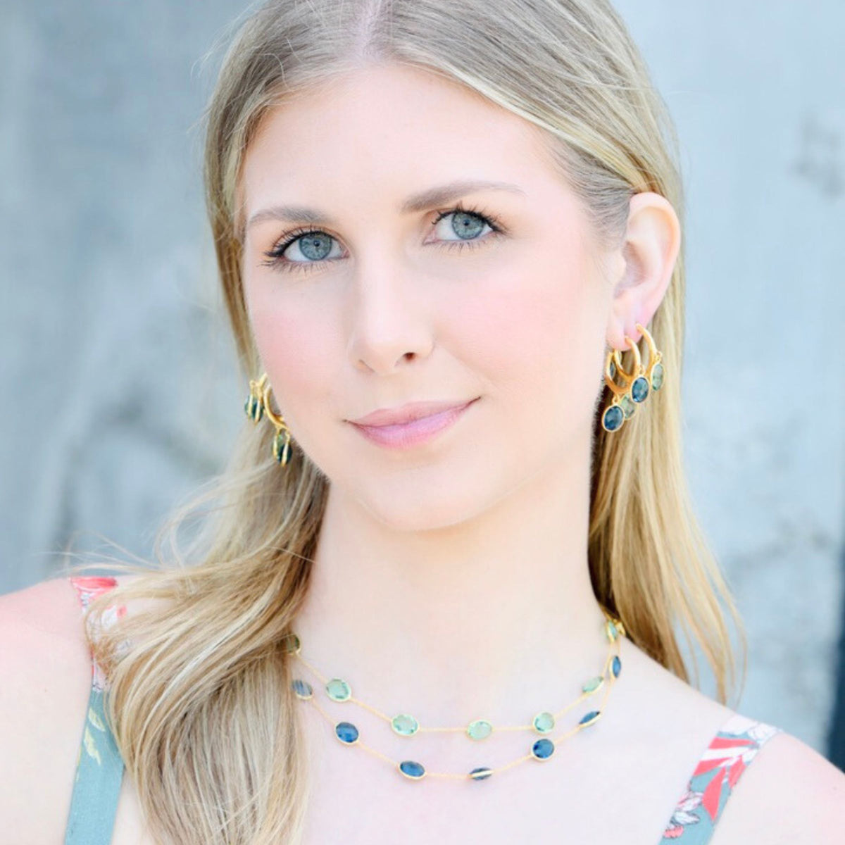 A glass and zirconia crystal in oval blue crystal, topaz-toned — a perfect thin chain necklace for layering, and one of our most versatile blue necklace picks.