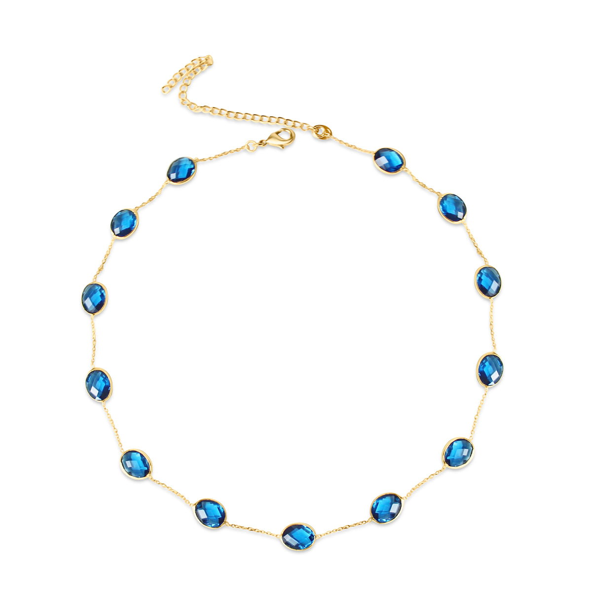 This oval blue crystal necklace pairs a navy blue crystal necklace with a sleek gold crystal necklace chain for effortless everyday sparkle.