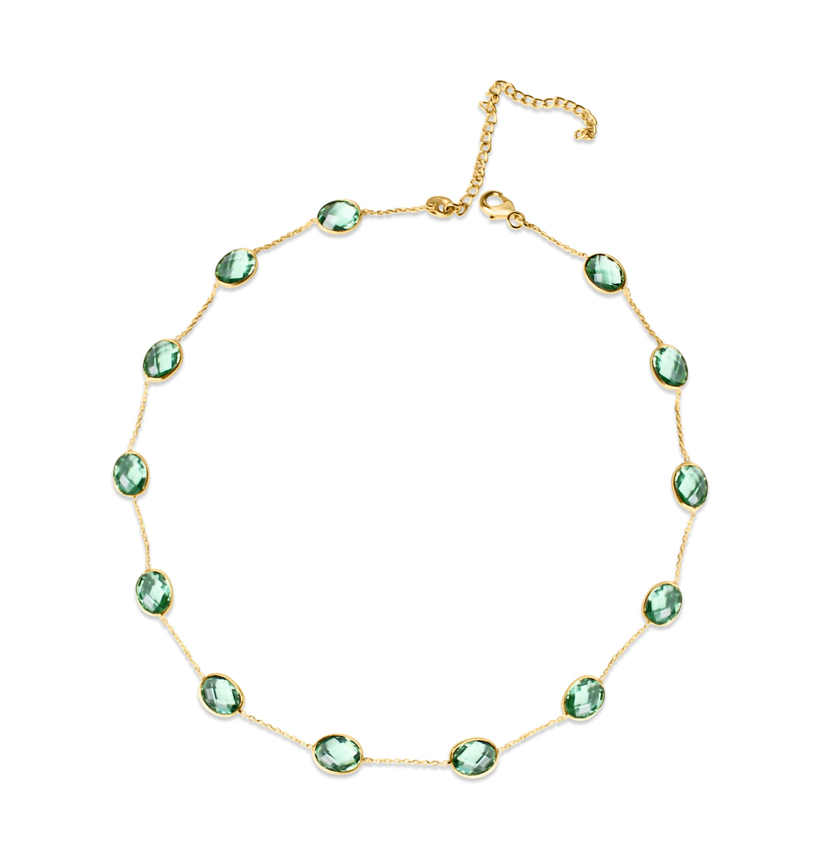 This oval green crystal necklace pairs a smooth green crystal with a sleek gold crystal necklace chain for effortless everyday color.