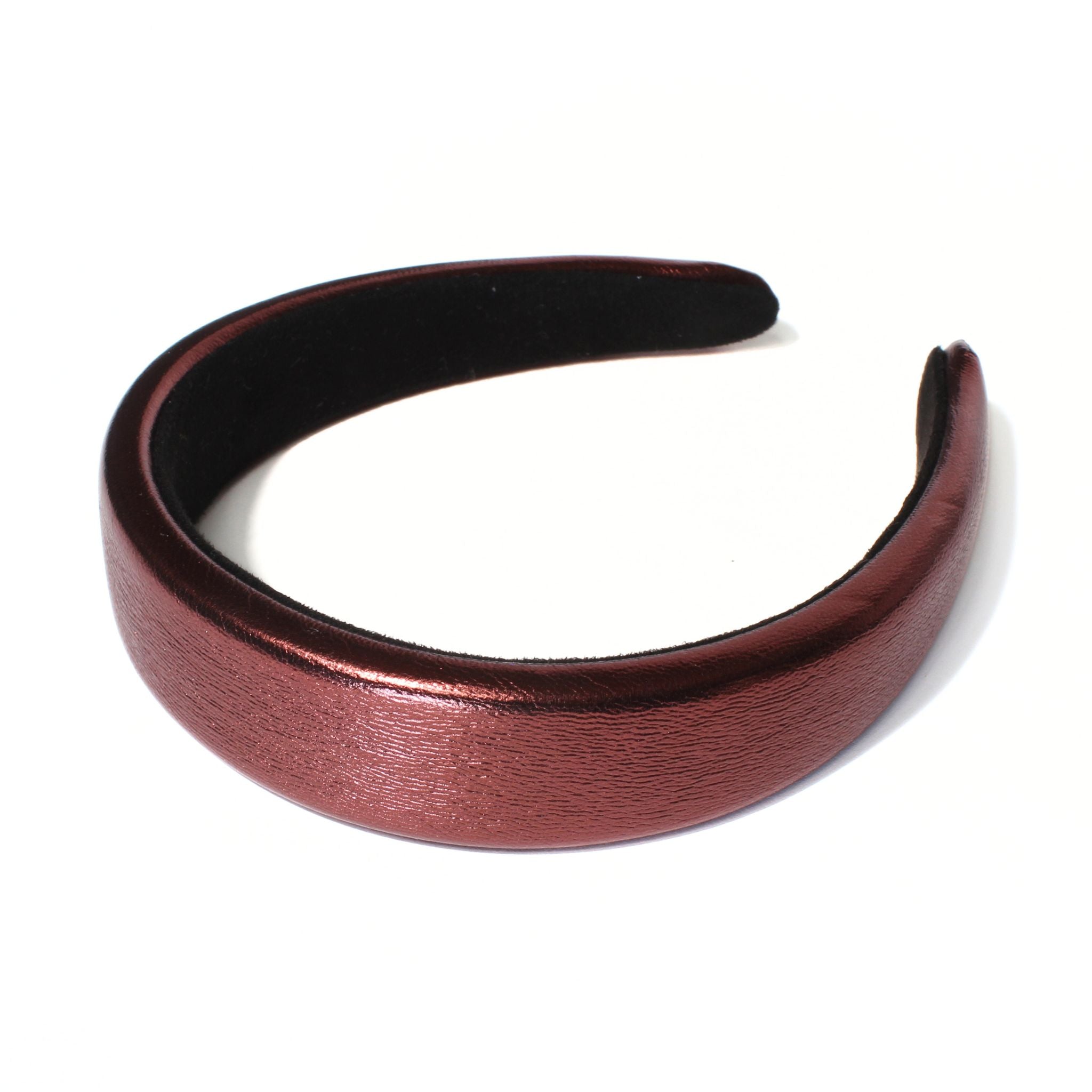 This red leather headband has a padded headband design, built for all-day comfort and a bold pop of color.