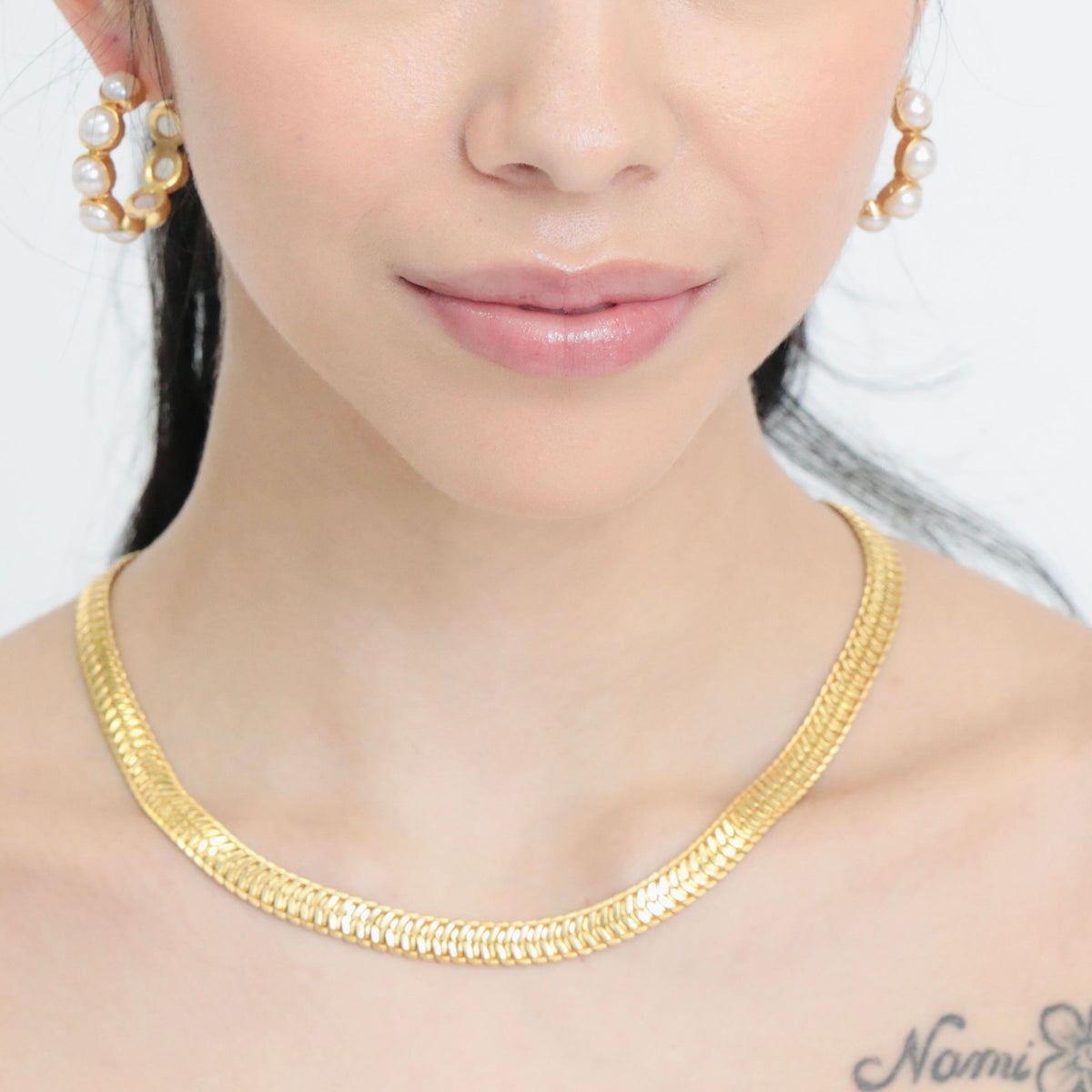 This snake chain necklace is a best-selling, unisex style by u-glam NYC — as at home on her as it is on him.